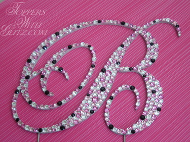 Crystal monogram cake topper using Rose, Light Rose, Crystal and Jet