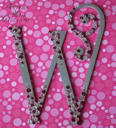 Swarovski cake topper using Crystal, Light Rose and Ruby